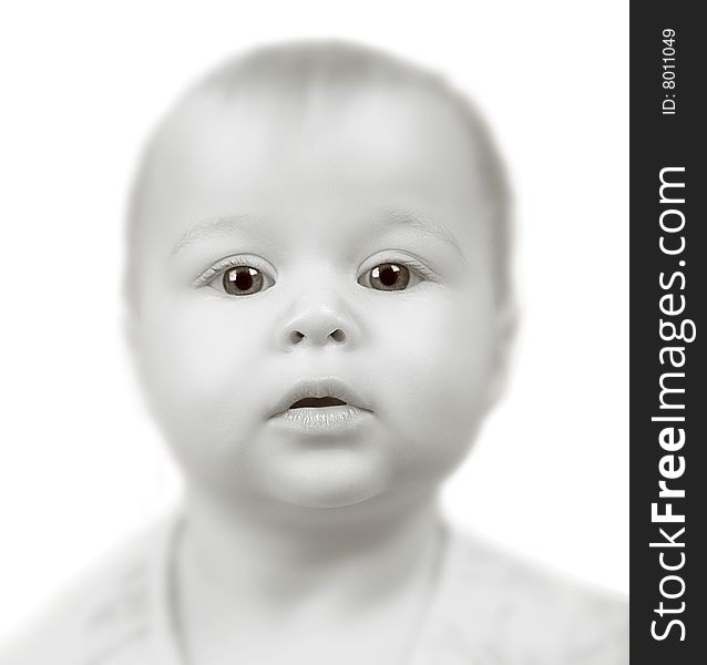 Bizarre Portrait of a Baby girl on white background with Very short focus.