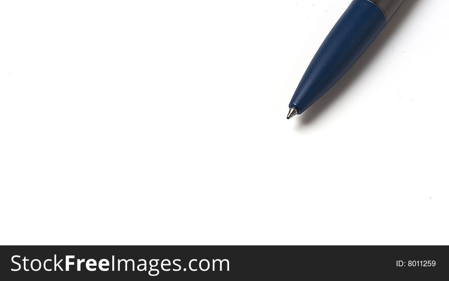 A macro picture of a pen and notebook. A macro picture of a pen and notebook