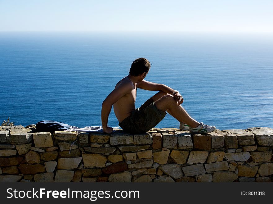 Young caucasian topless man having a rest. Young caucasian topless man having a rest
