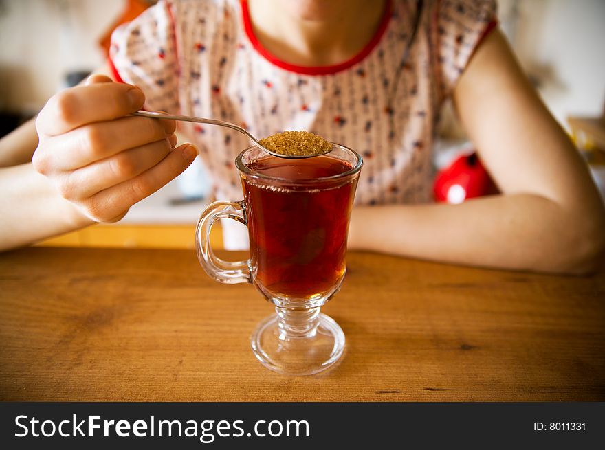 Caucasian woman is having her morning tea