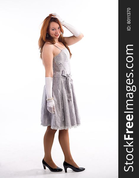 Young girl with white gloves standing on white background. Young girl with white gloves standing on white background