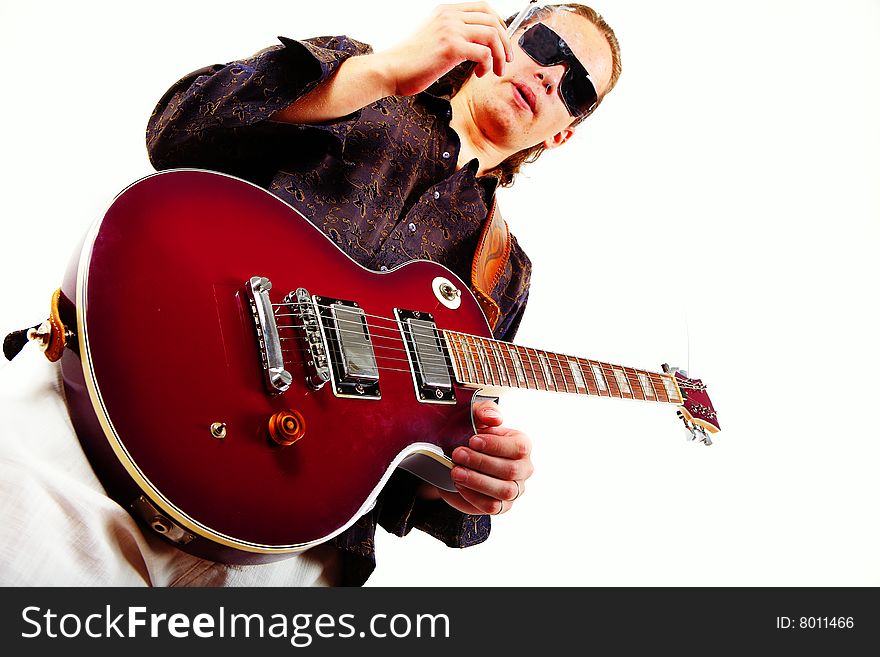Bass guitarist isolated on white
