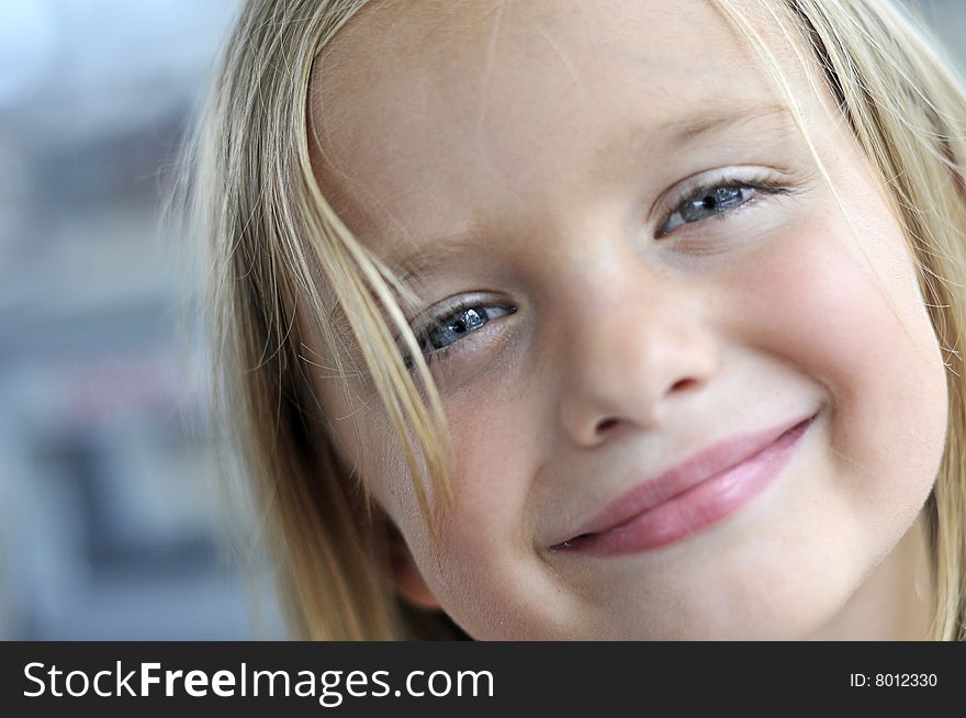 A cute little girl smiling