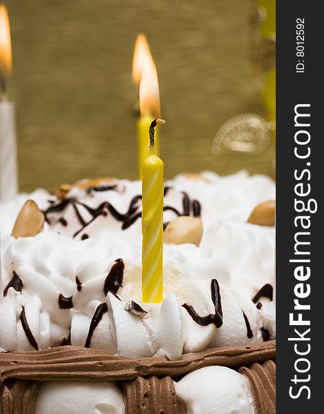 Cake and candles on celebratory table