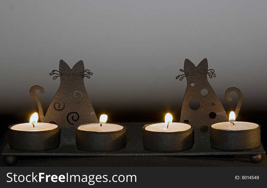 Candlestick with cats with four candle