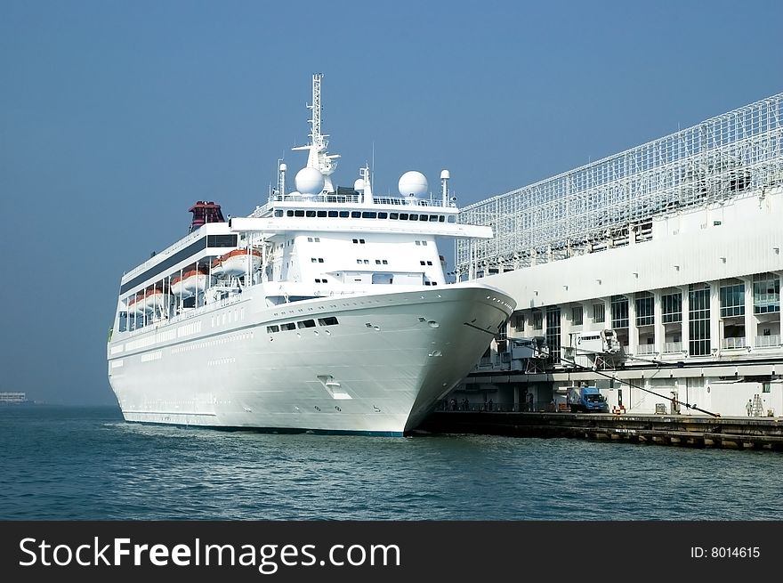 Big passanger's ferry in Hongkong harbour waiting for departure, cruising between Thailand, Vietnam, China and Hongkong. Big passanger's ferry in Hongkong harbour waiting for departure, cruising between Thailand, Vietnam, China and Hongkong.