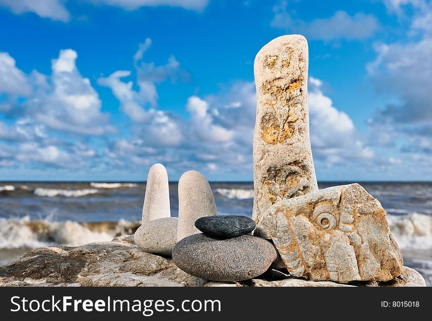 Sea pebble on seacoast in the windy morning in the summer. Sea pebble on seacoast in the windy morning in the summer