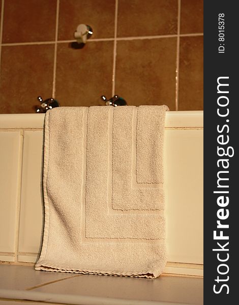 Cotton White Towel Hanging On Bath