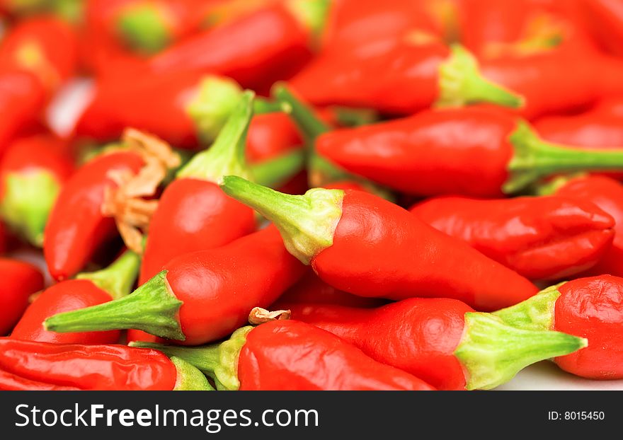 Close-up colorful chili peppers background. Close-up colorful chili peppers background