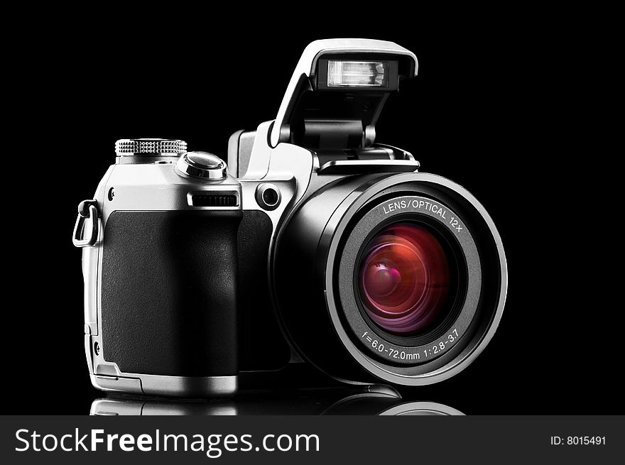 Photo camera isolated on black