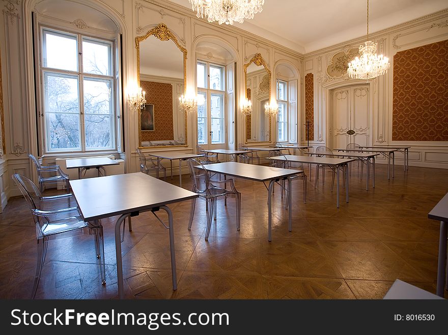 Empty classroom in the castle with glass seats