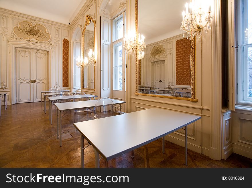 Empty classroom in the castle with glass seats