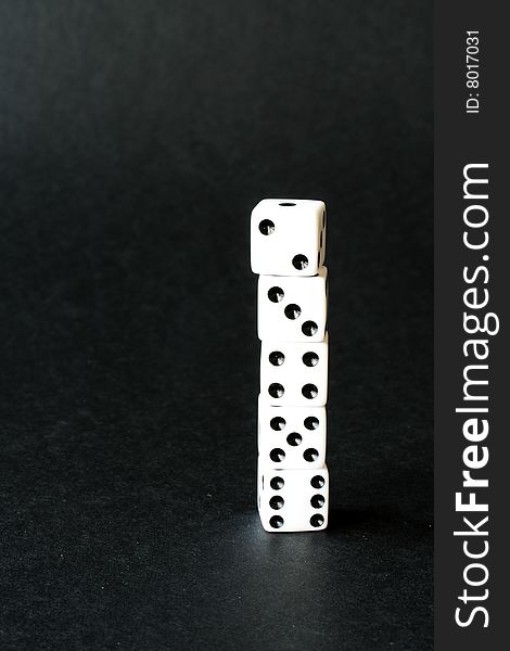 Five dice stacked, showing a straight. Five dice stacked, showing a straight