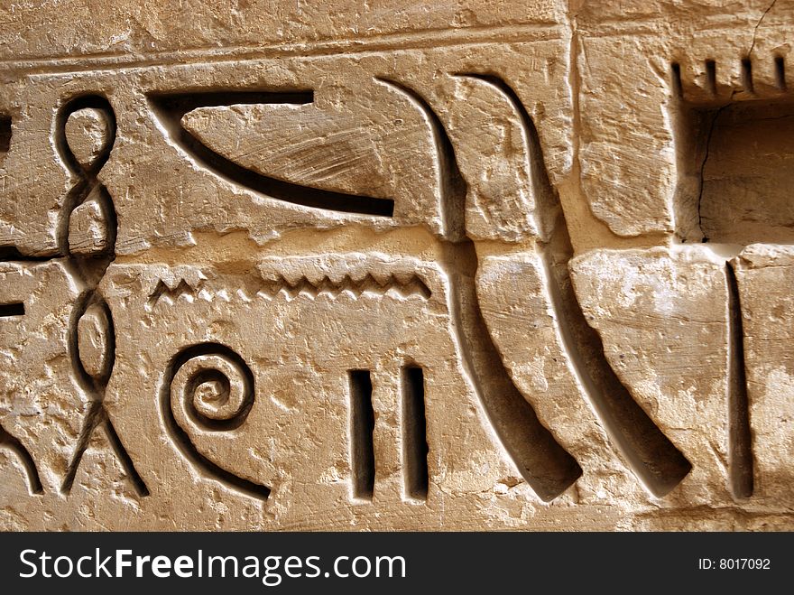Closeup of hieroglyphs in Habu city Luxor