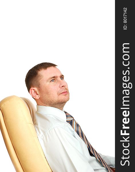 Man Sitting On The Armchair Isolated On White Back