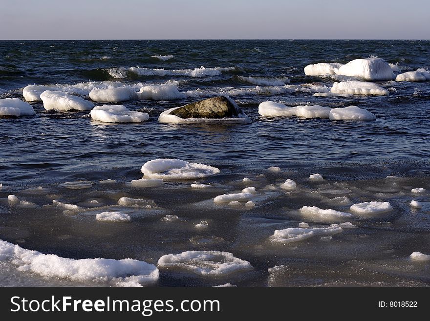 Cold February weather on waves of Baltic sea