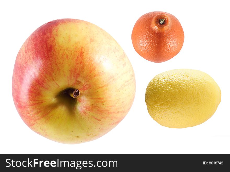 Apple, orange and lemon under the white background. Apple, orange and lemon under the white background