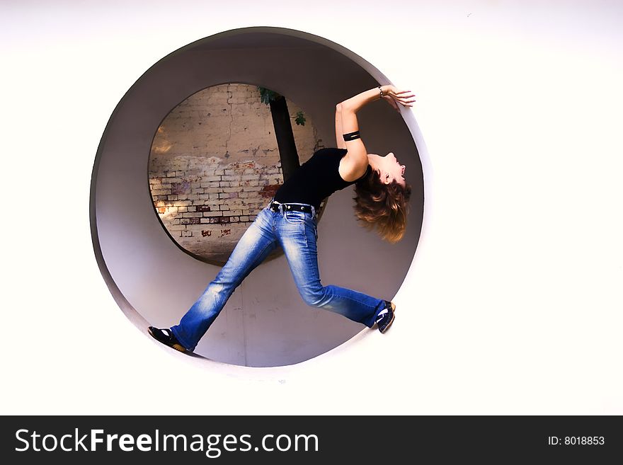 Girl in a round aperture