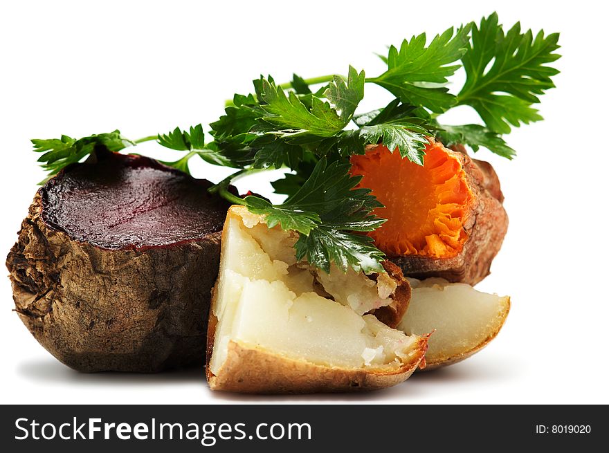Grilled vegetables: potato, carrot, beet, and parsley isolated on a white background. Grilled vegetables: potato, carrot, beet, and parsley isolated on a white background