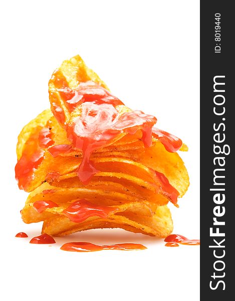 Potato chips with ketchup isolated on a white background&