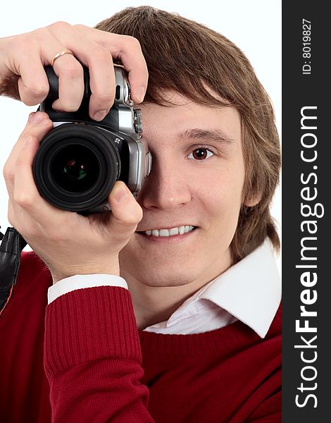 Young photographer man on white background