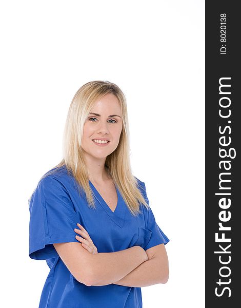 Studio shot of a nurse isolated on white with crossed arms. Studio shot of a nurse isolated on white with crossed arms