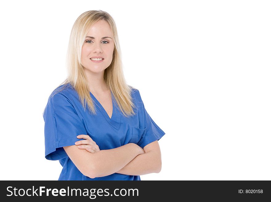 Studio shot of a nurse isolated on white with crossed arms. Studio shot of a nurse isolated on white with crossed arms