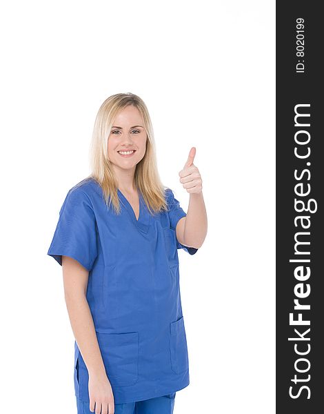 Studio shot of a nurse isolated on white with thumbs up. Studio shot of a nurse isolated on white with thumbs up