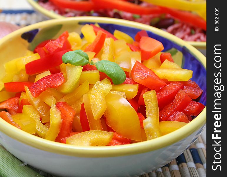 A fresh salad of red and yellow paprika
