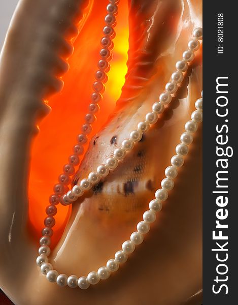 Pearls And Abstract Background.