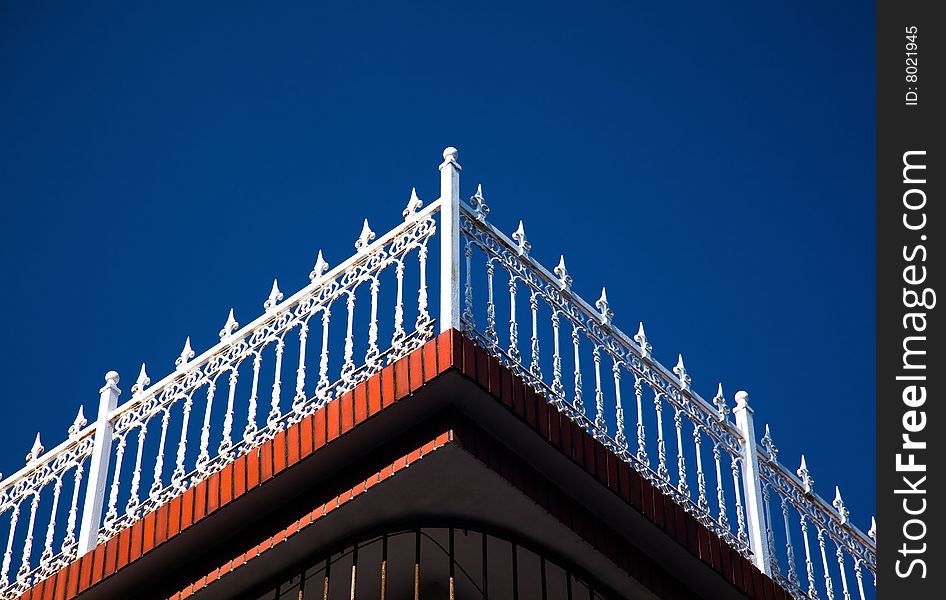 Architectural handrail on the building roof, indicate a leisureful and romantic lifestyle, or a happy vacation. Architectural handrail on the building roof, indicate a leisureful and romantic lifestyle, or a happy vacation