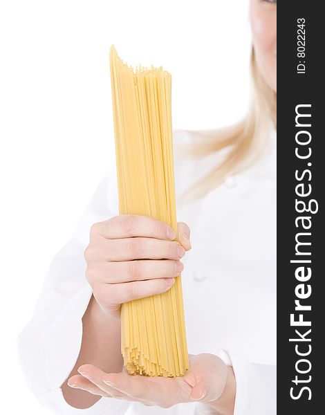 Close up of spaghetti in hand o a chef. Close up of spaghetti in hand o a chef