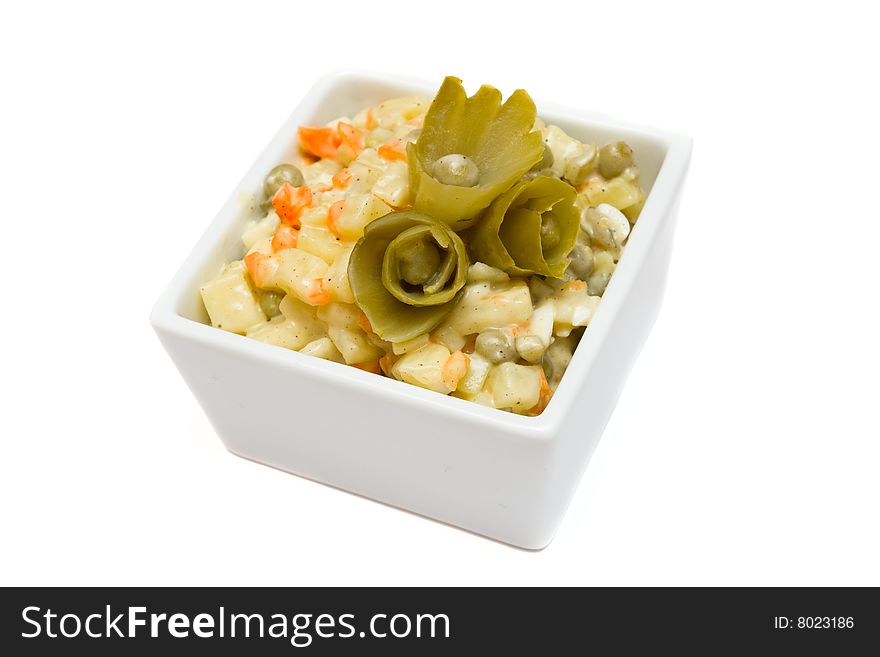 Salad from boiled vegetables in the white salad-bowl. Salad from boiled vegetables in the white salad-bowl