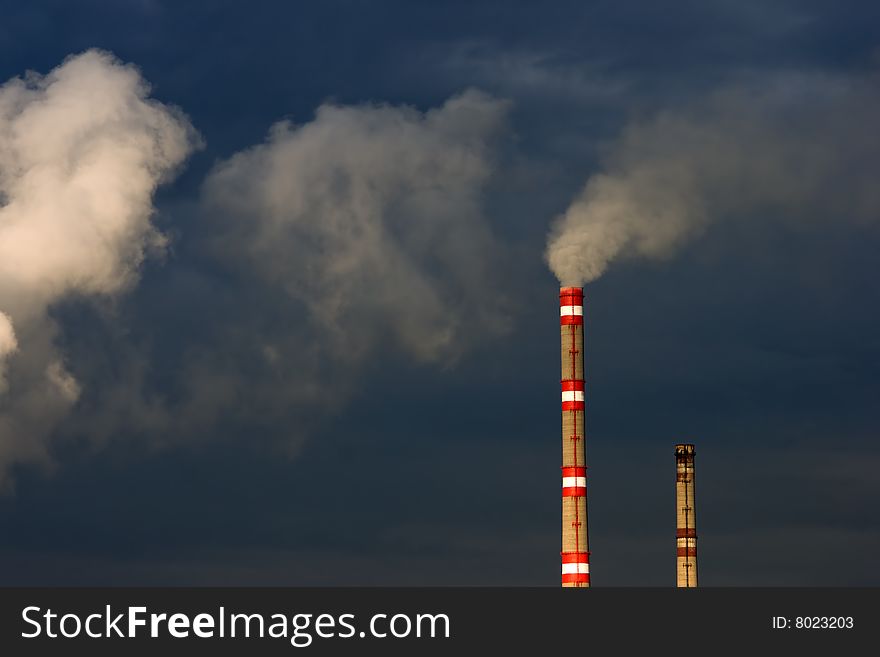 Exhaust and clouds of smoke in sky. Exhaust and clouds of smoke in sky