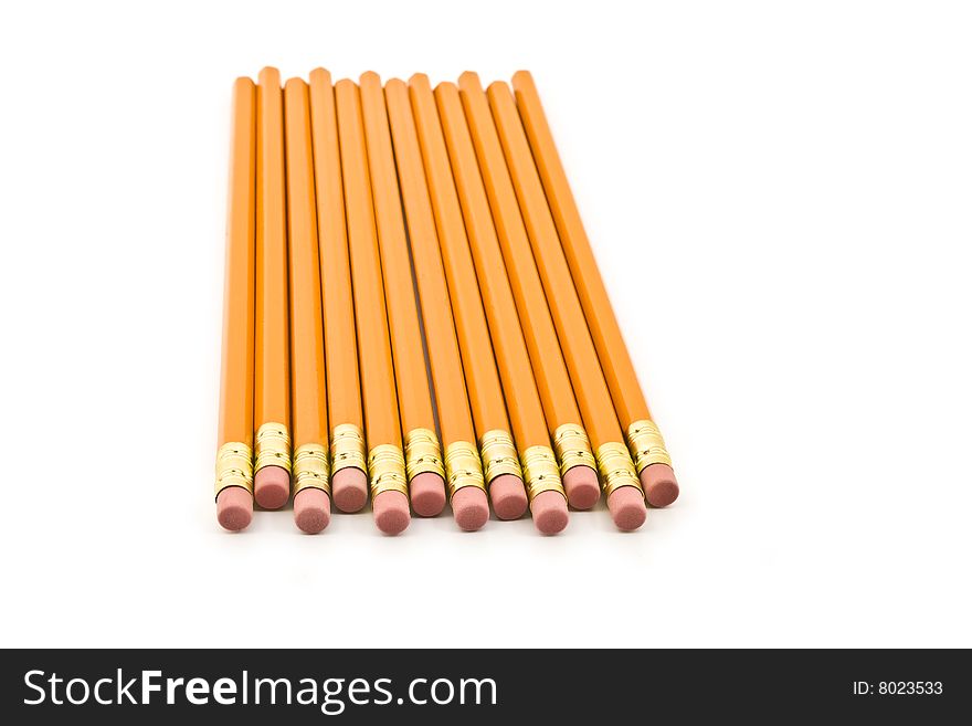 Pencils staggered and isolated on a white background. Pencils staggered and isolated on a white background