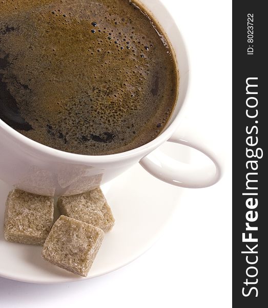 Coffee cup and sugar on a white background