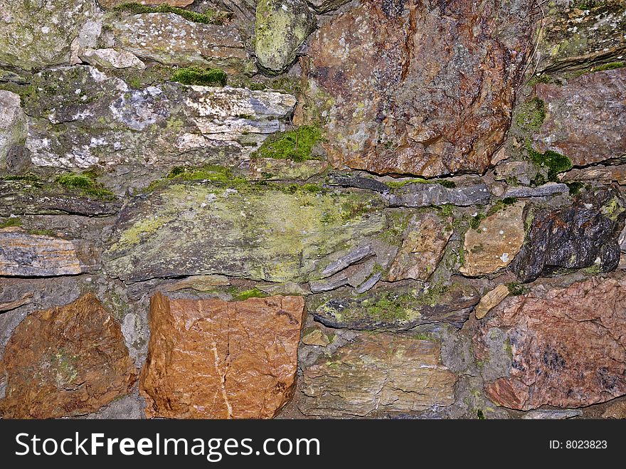 Old stone wall texture can be used as a background