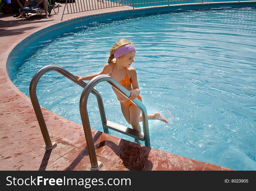 Girl at the swiming pool. Girl at the swiming pool