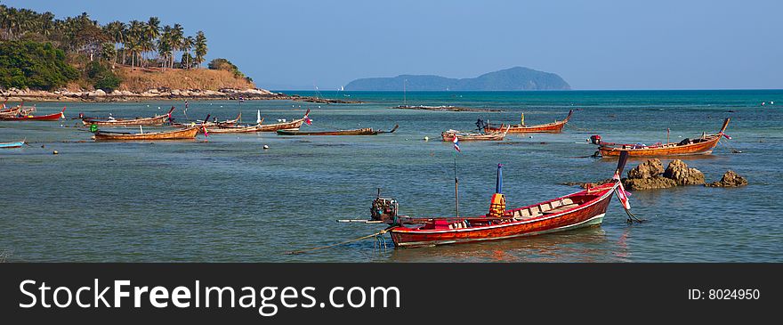 Boats on the sea, rock, Palms