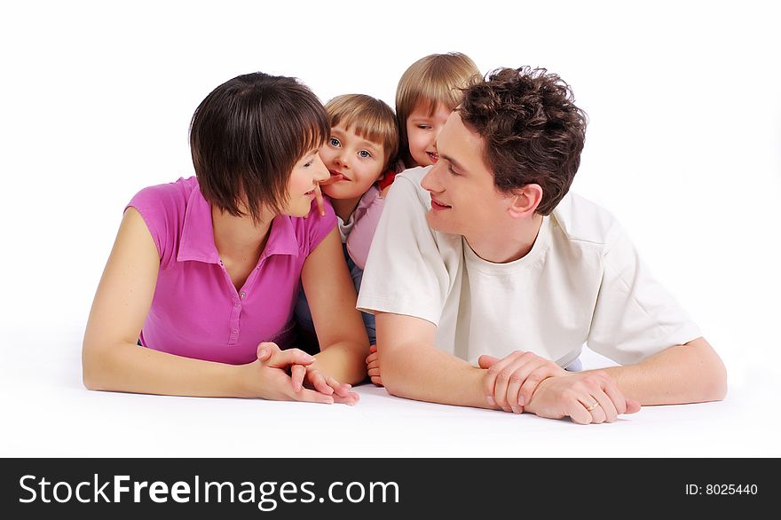 Portrait of a attractive young family smiling a break and relaxing. Portrait of a attractive young family smiling a break and relaxing