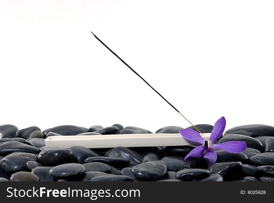 Stacked zen stones with flower. Stacked zen stones with flower