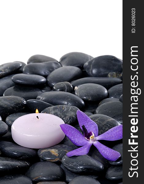 Stacked zen stones with flower. Stacked zen stones with flower