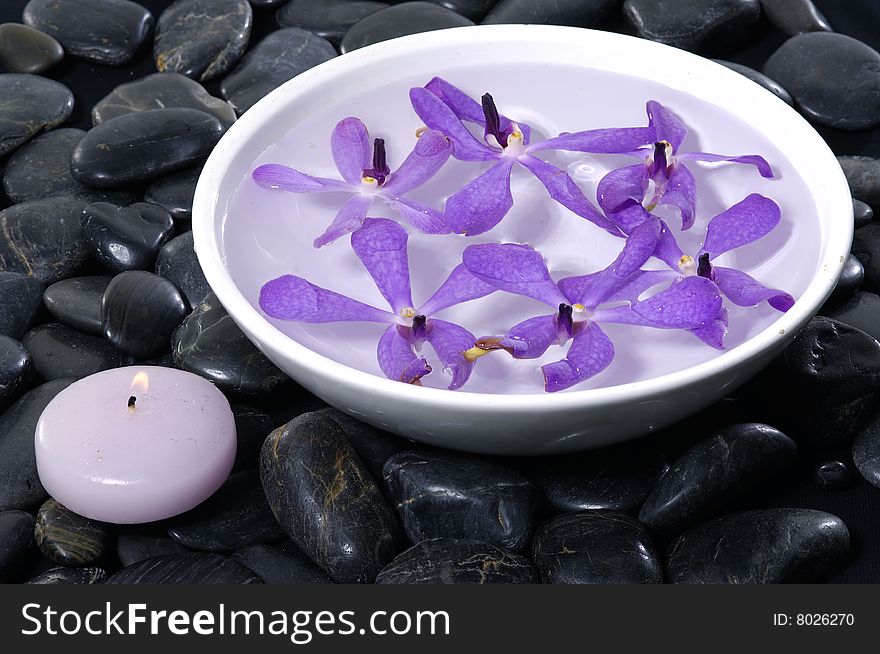 Stacked zen stones with flower. Stacked zen stones with flower