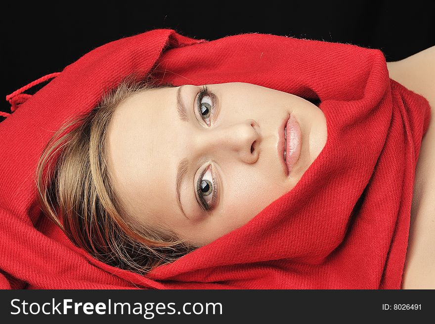 Girl lying , Wearing a red color scarf