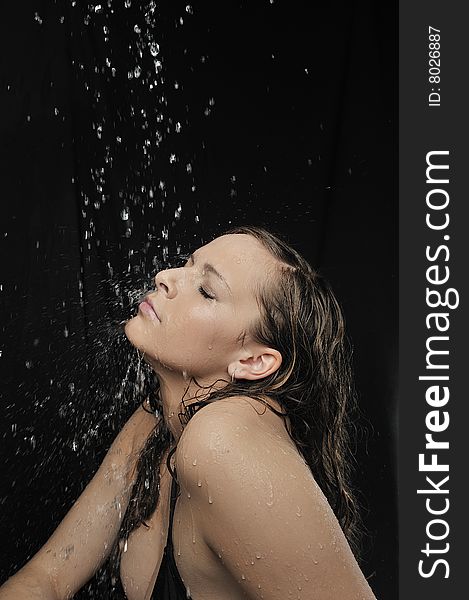 Young beauty woman under shower in bath room. Young beauty woman under shower in bath room