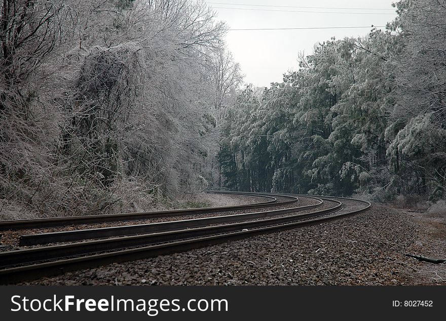 Icy train tracks following a winter storm. Icy train tracks following a winter storm