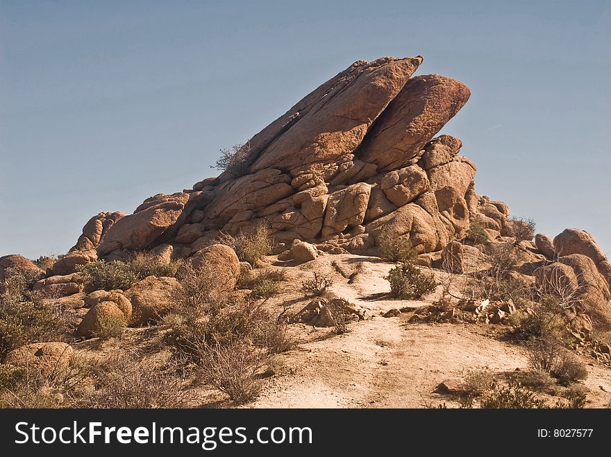 This is a picture of jutting boulders at Joshua Tree National Park. This is a picture of jutting boulders at Joshua Tree National Park.