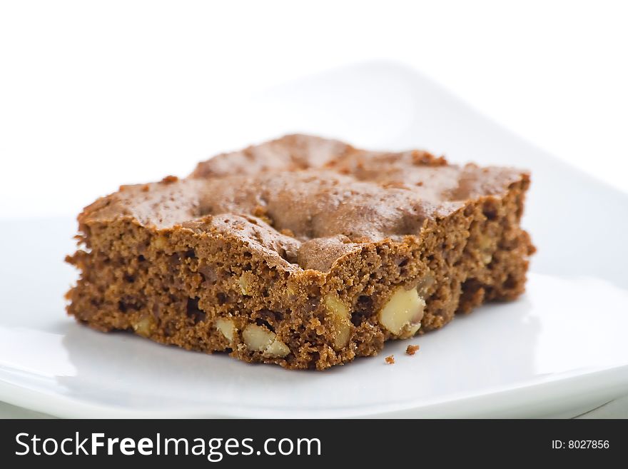 Hot chocolate brownie with walnuts and vanilla isolated