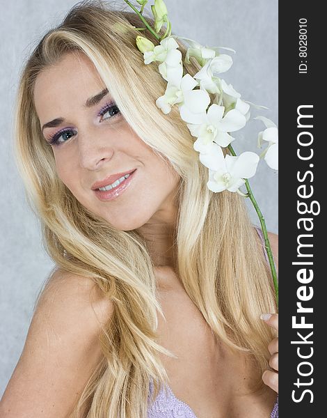 Blond girl with flower