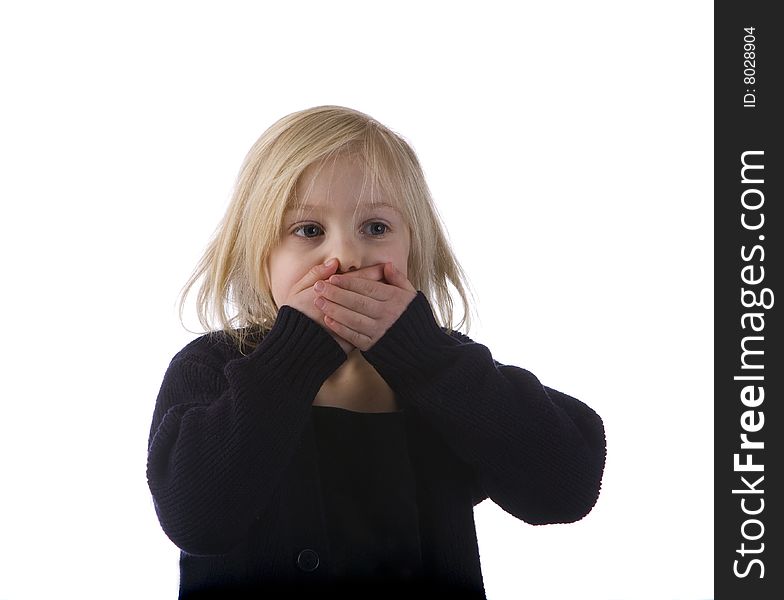 Child Covering Mouth In Surprise